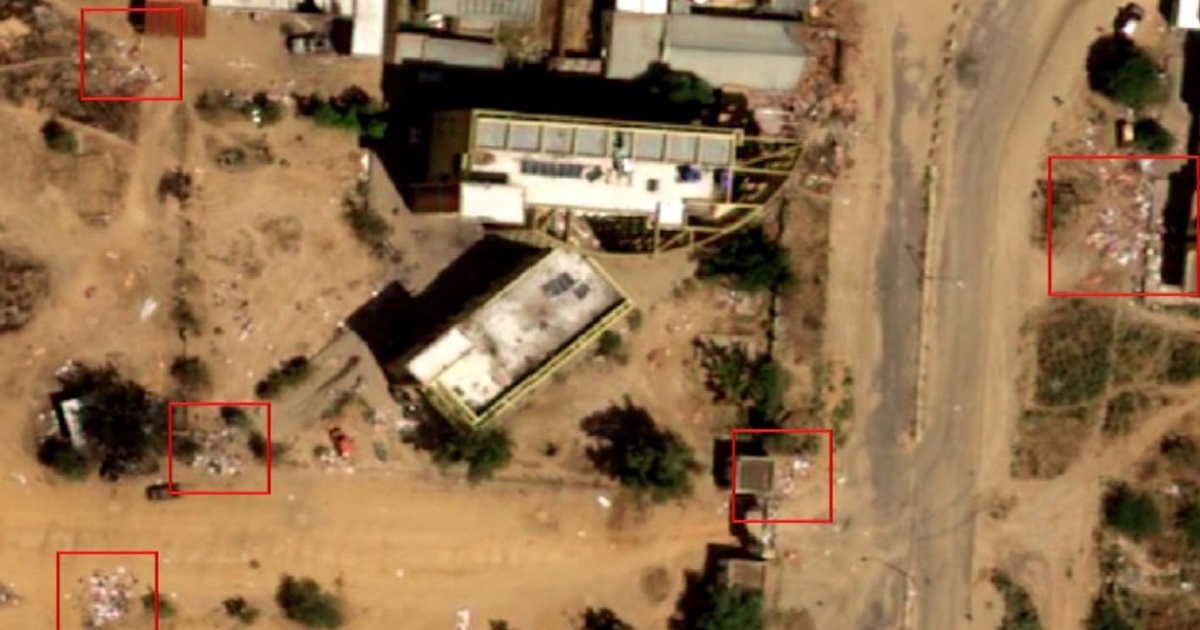 sudan massacre blood, pile of corpses from visible from space
