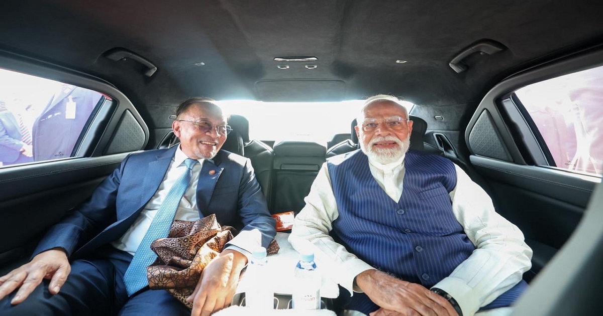 Pm modi begins Malaysia visit shares car with pm anwar ibrahim