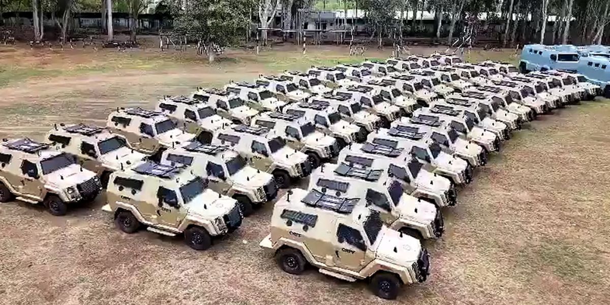 west bengal election commision and crpf news armored vehicles stand lined up in rows a massive show of force by security personnel to ensure a violence-free final phase of voting
